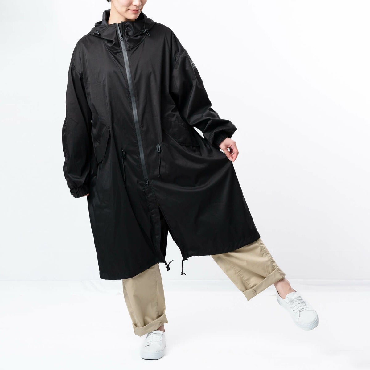 裾のバタつきを防止するスナップボタン