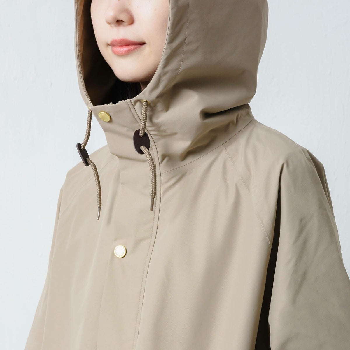 ドローコード付きのフード